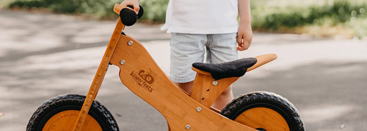 Wooden children's balance bike