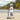 Kind mit Scoot and Ride Schoner Set XXS Steel